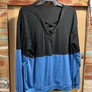 Blue and black top V-neck crisscross design